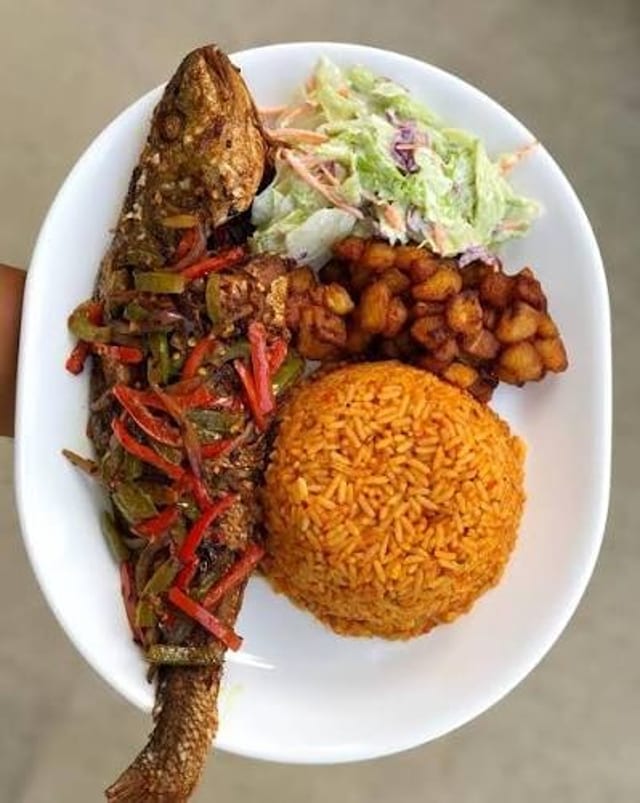 Jollof Rice W/ Fried Whiting Fish.