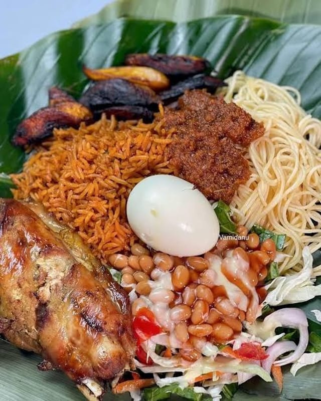 1/2 Jollof & 1/2 Waakye Fried Goat.