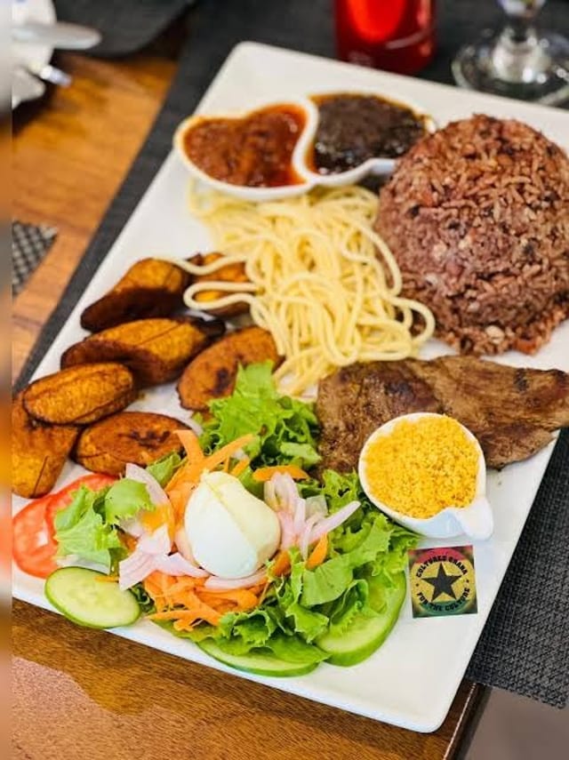 Waakye W/ Fried Goat.