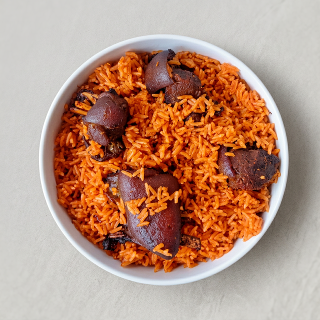Jollof Rice W/ Fried Goat.